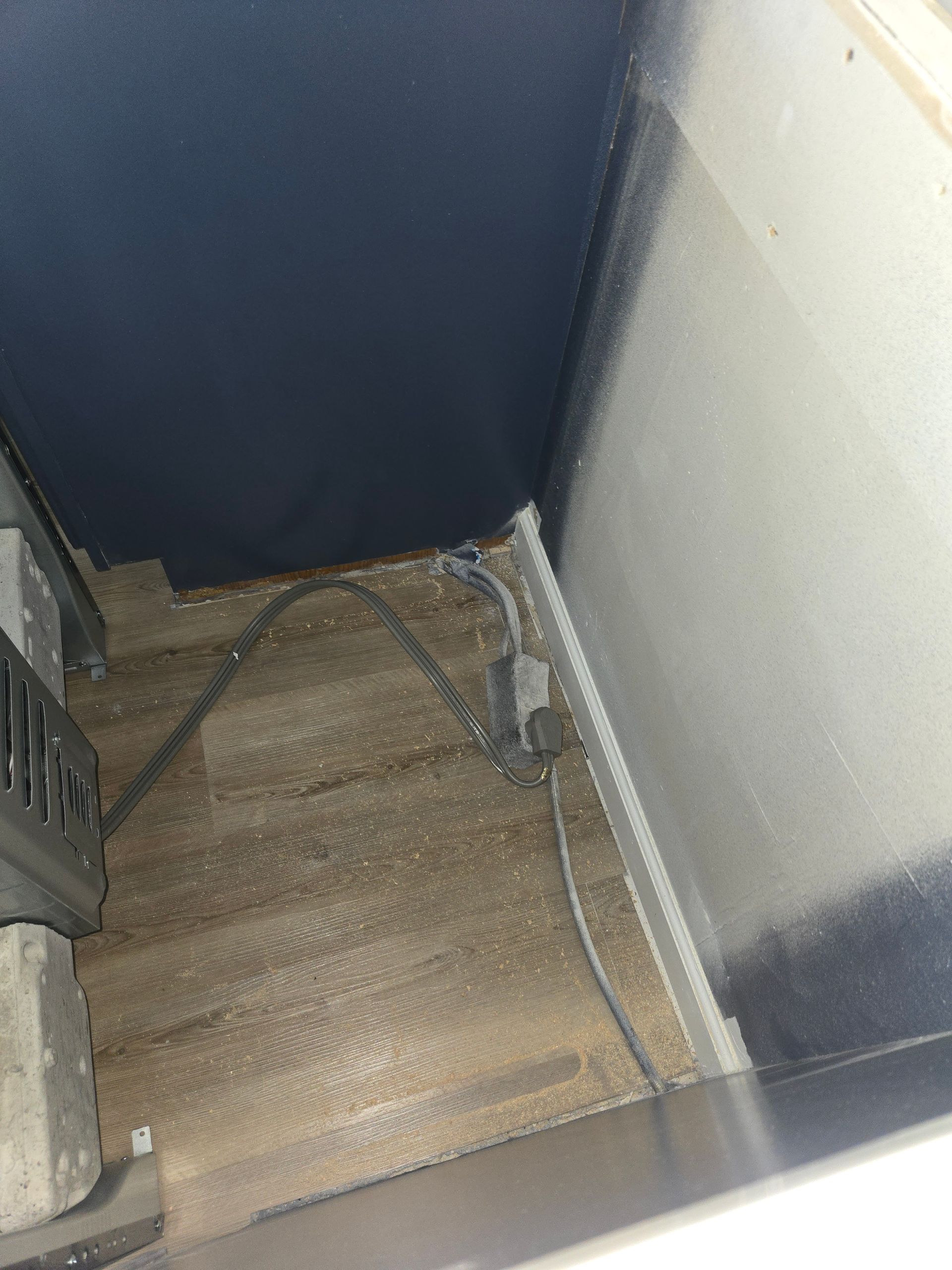 A staircase with a few wires coming out of it.