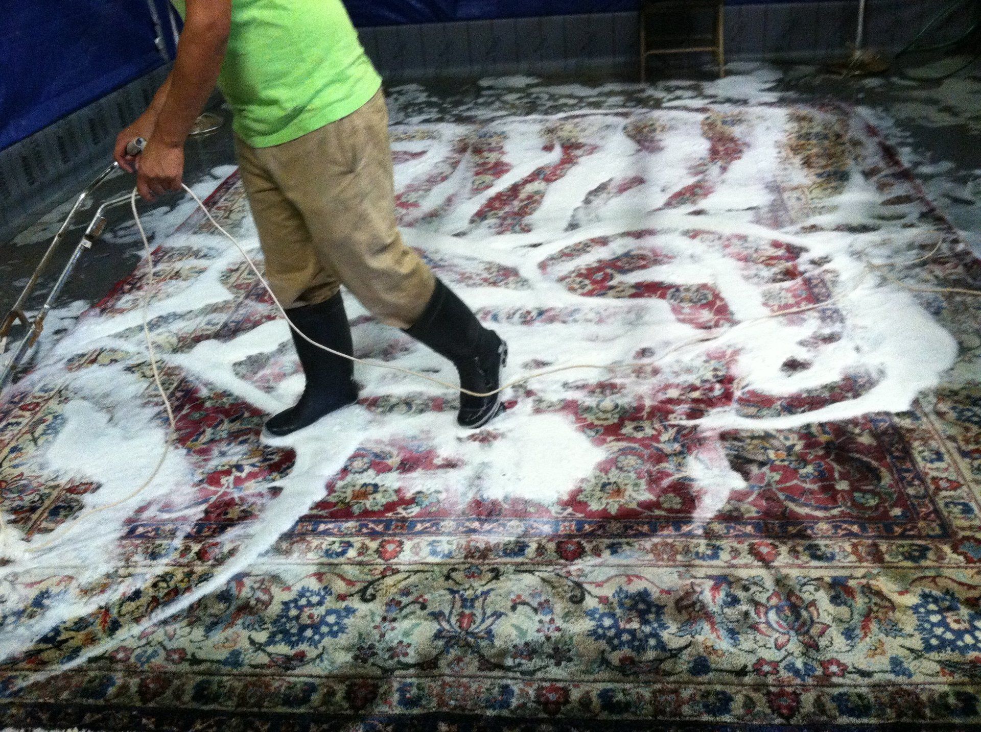 man doing carpet cleaning