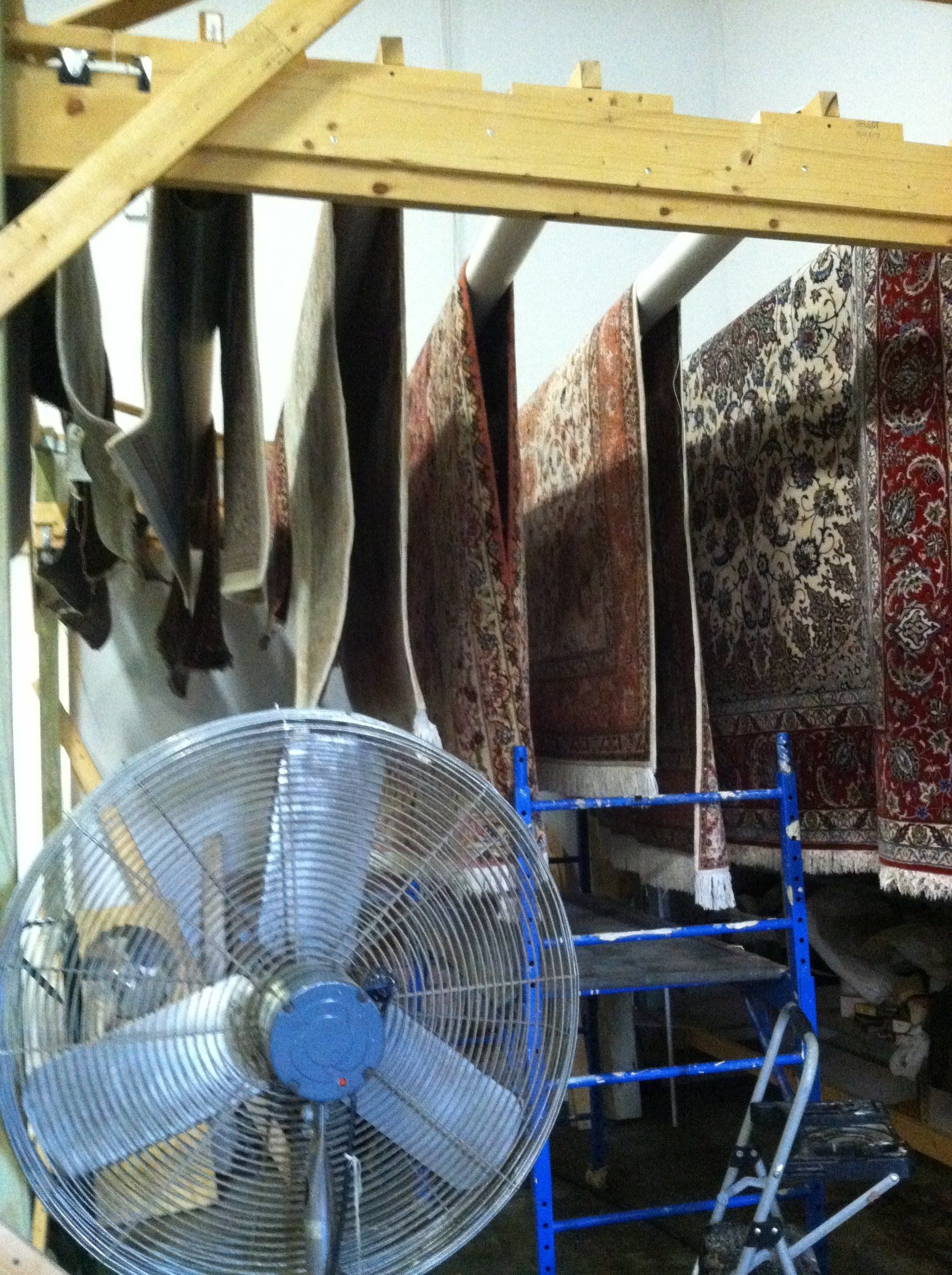 hanging carpet to dry with fan