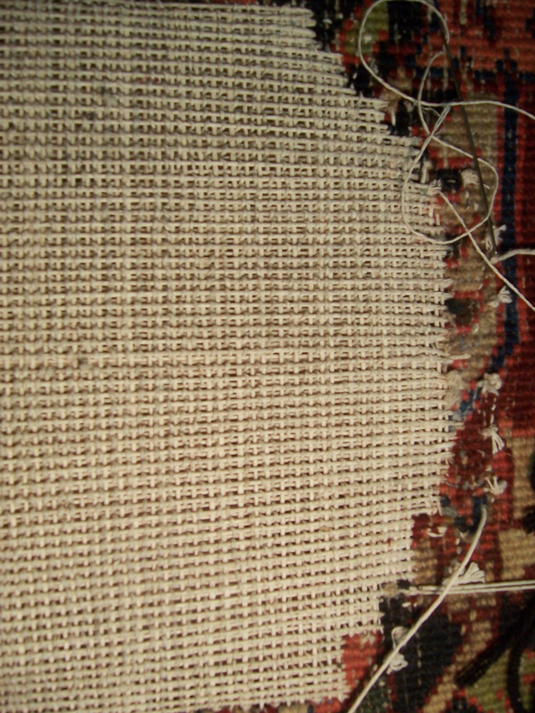 working on rug reweaving