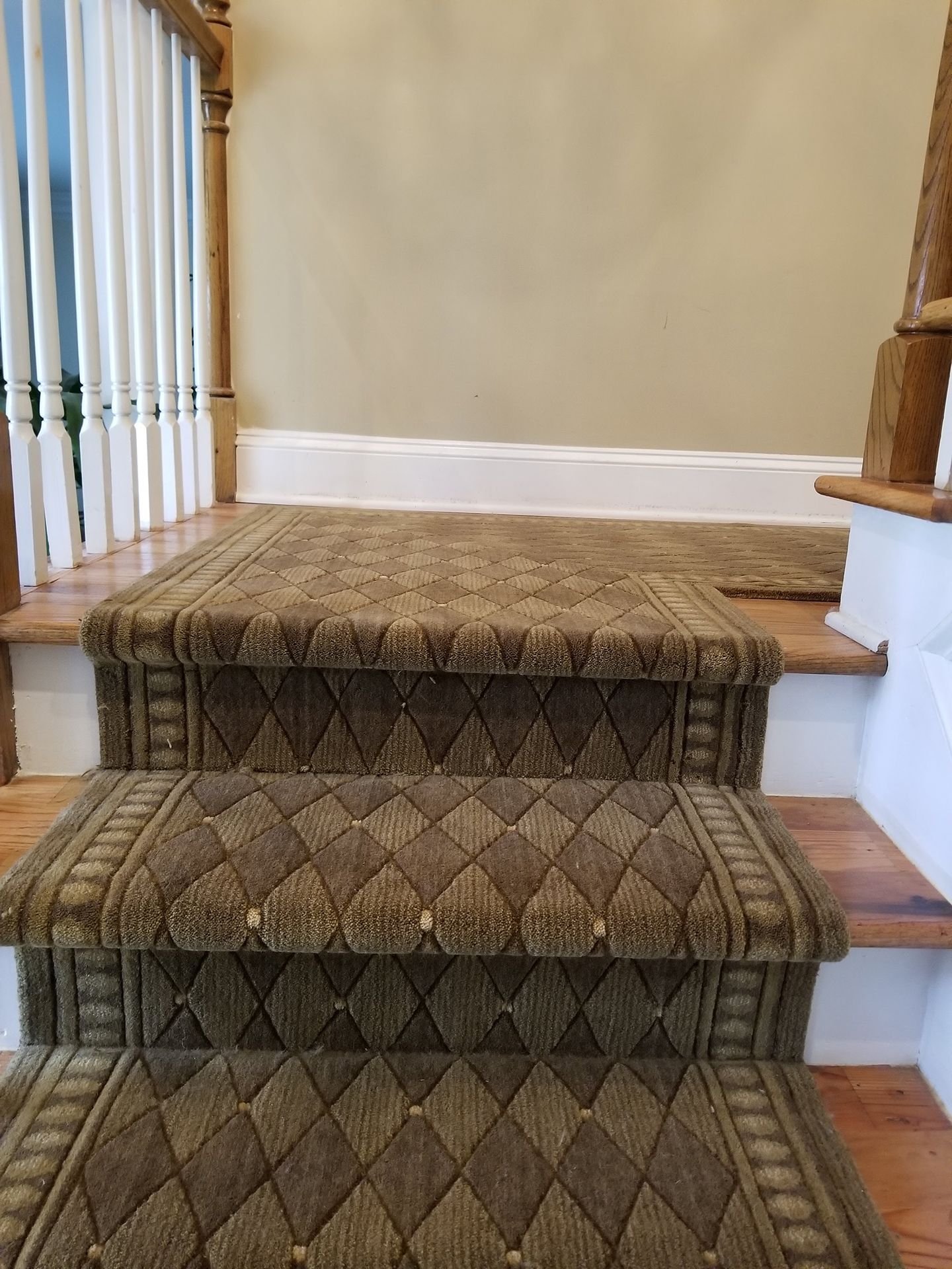 Newly installed brown stair runners