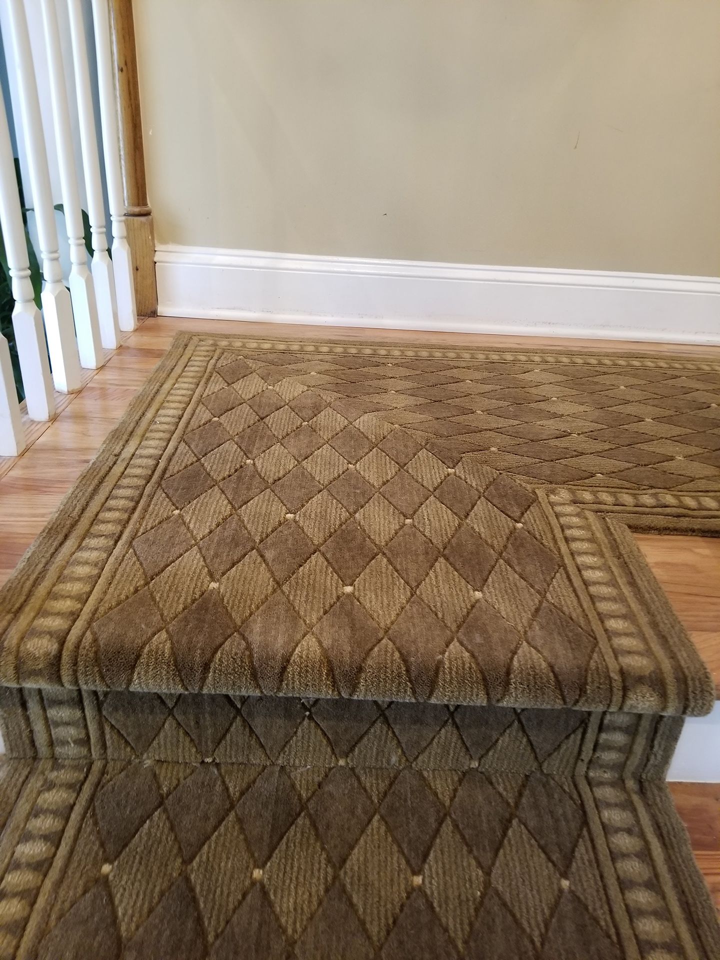 Brown stair runner installations