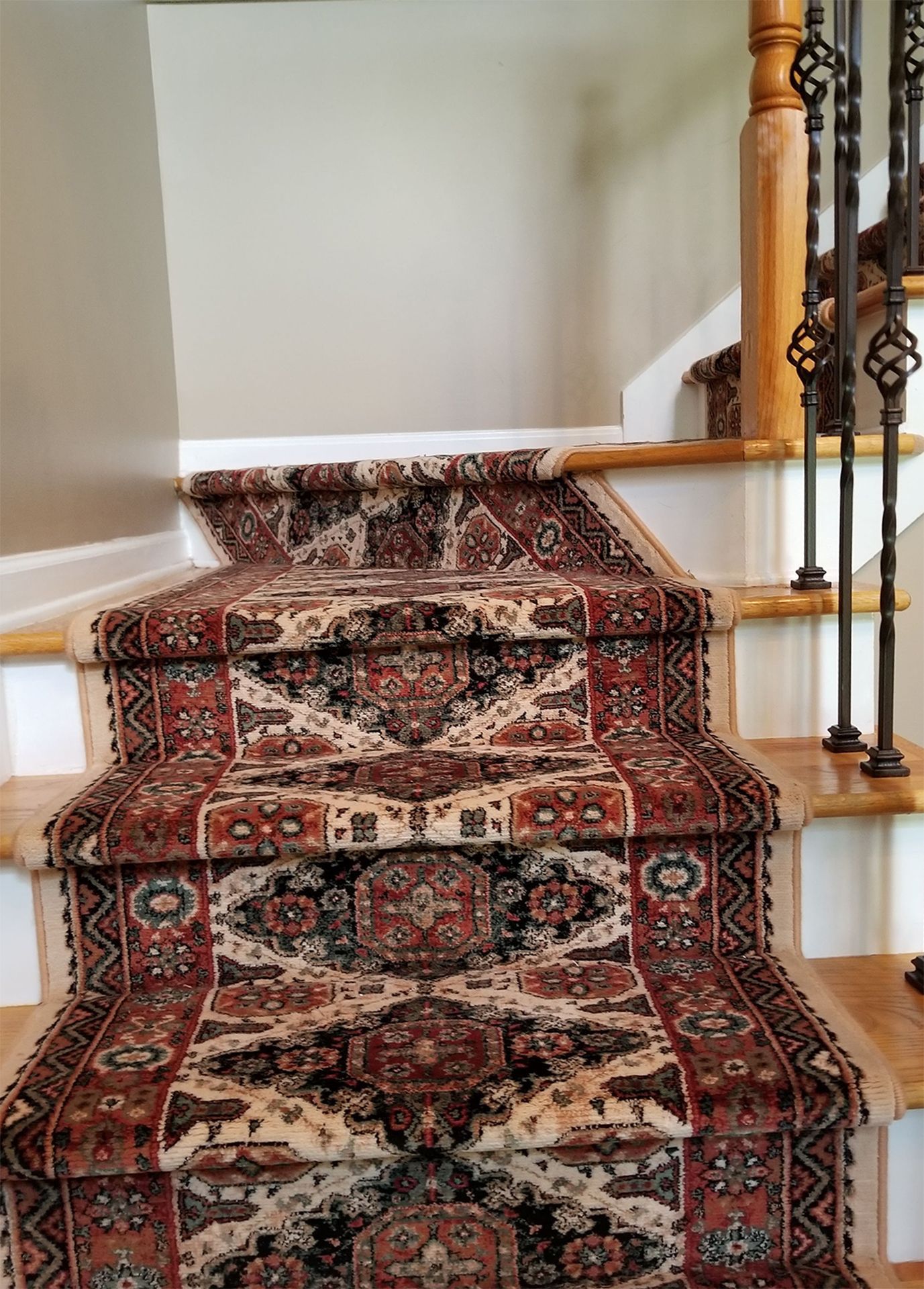 Newly installed oriental-patterned floor runner