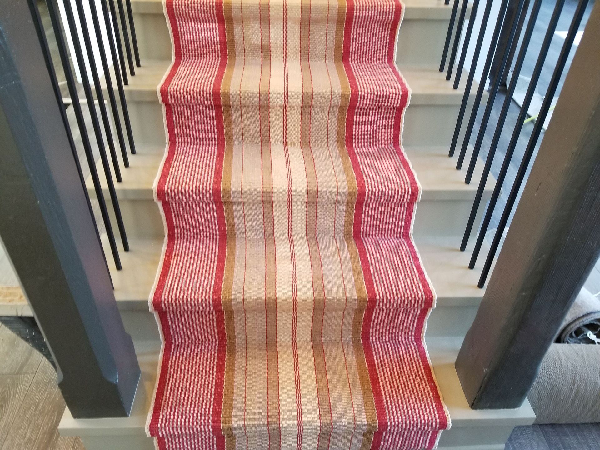 Newly installed red & brown stripe floor runner