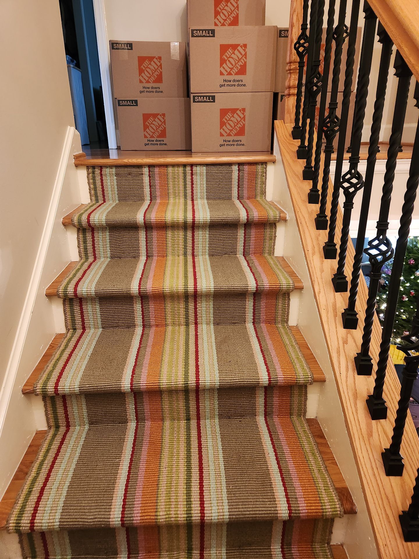 Colored stripe floor runner installation