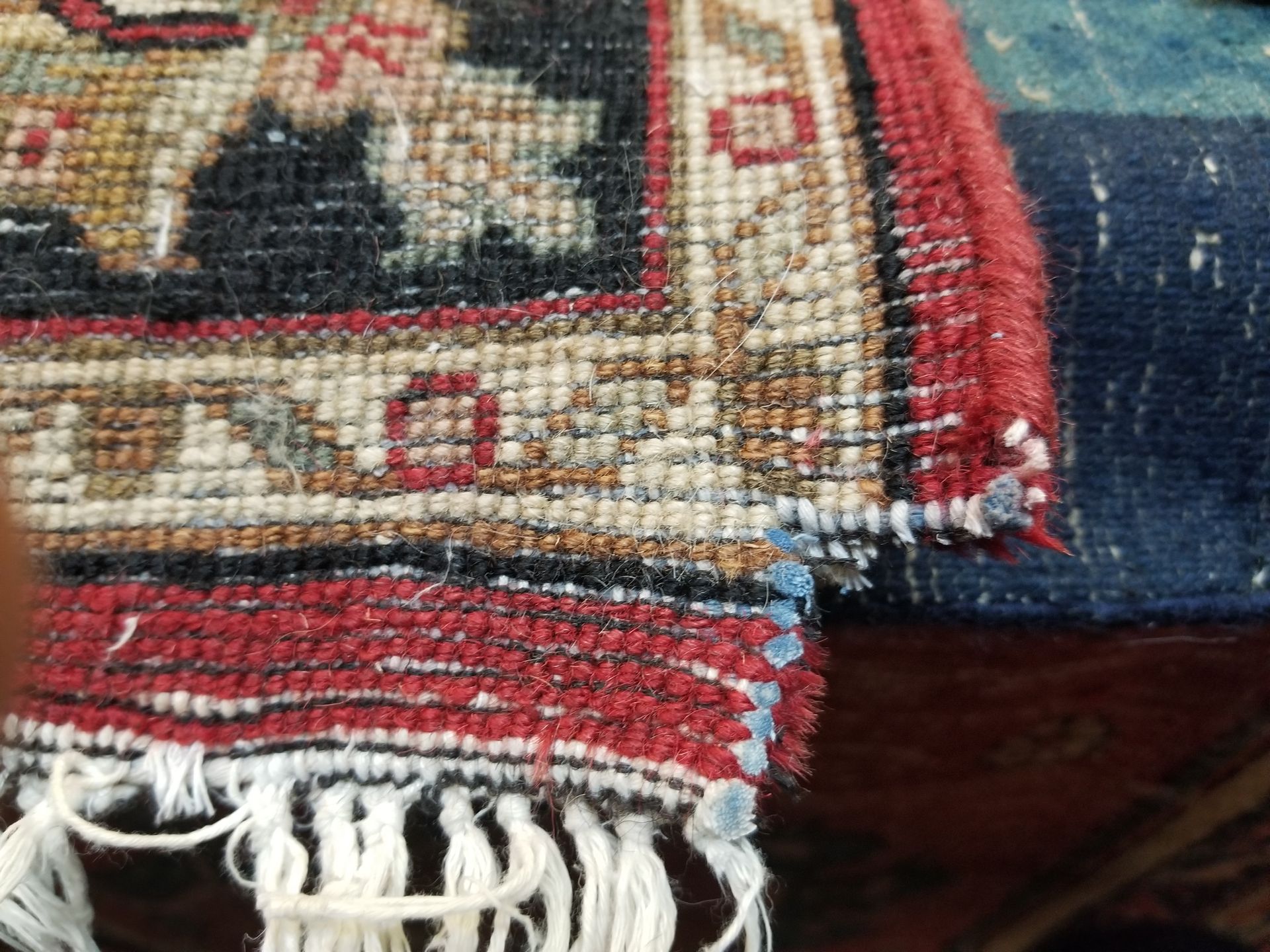 rug with damaged corner