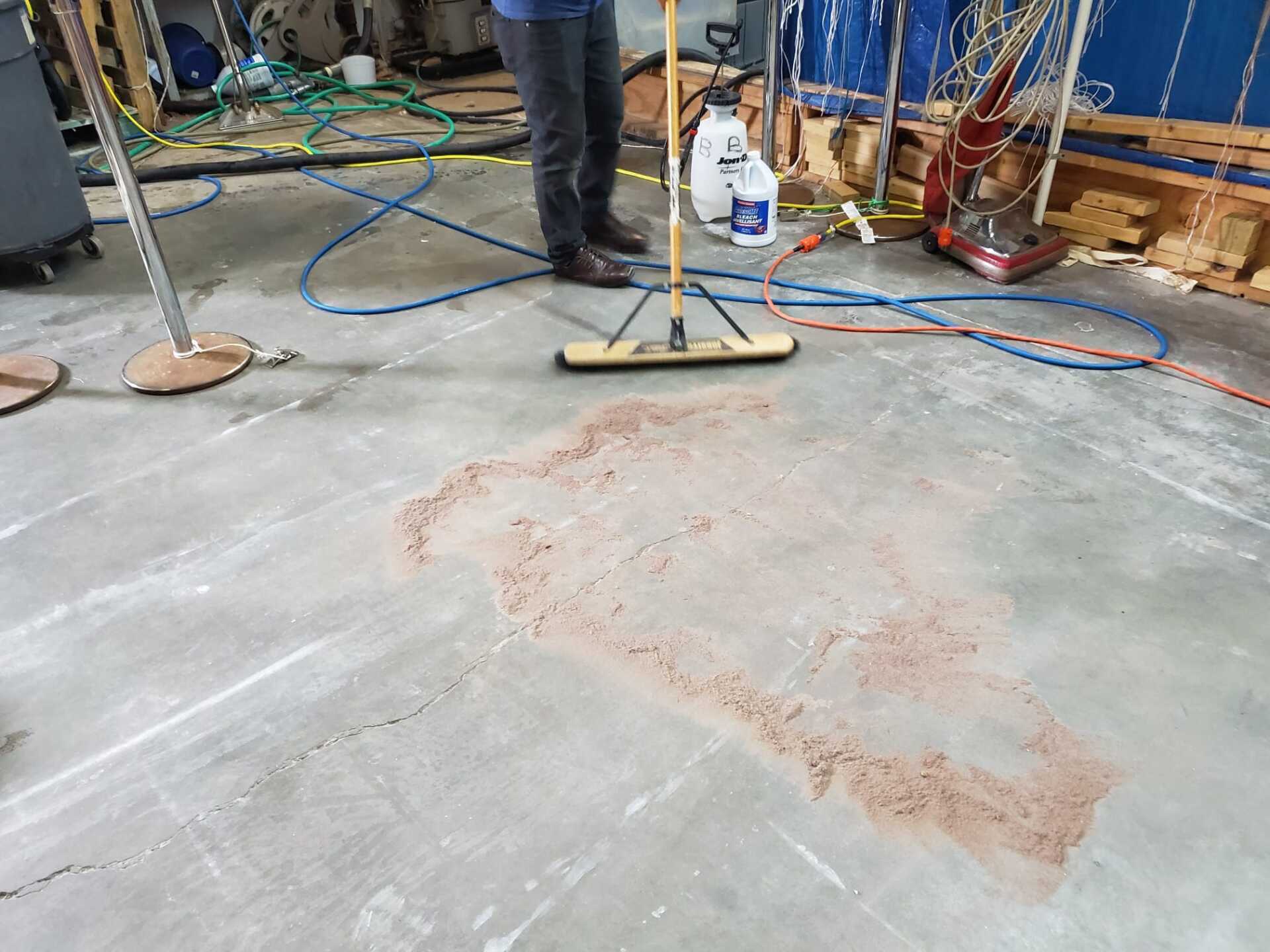 Cleaning up dirt left over from rug washing