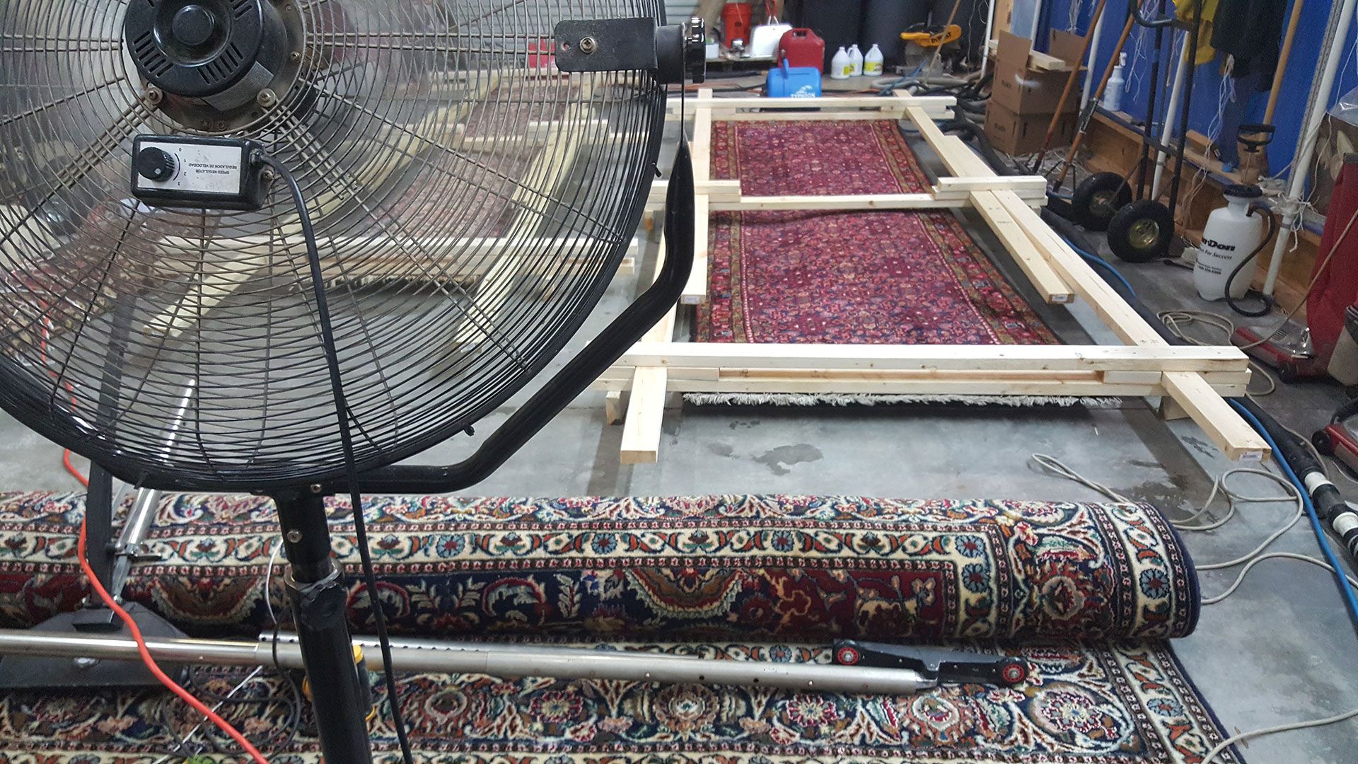 rugs drying on the floor