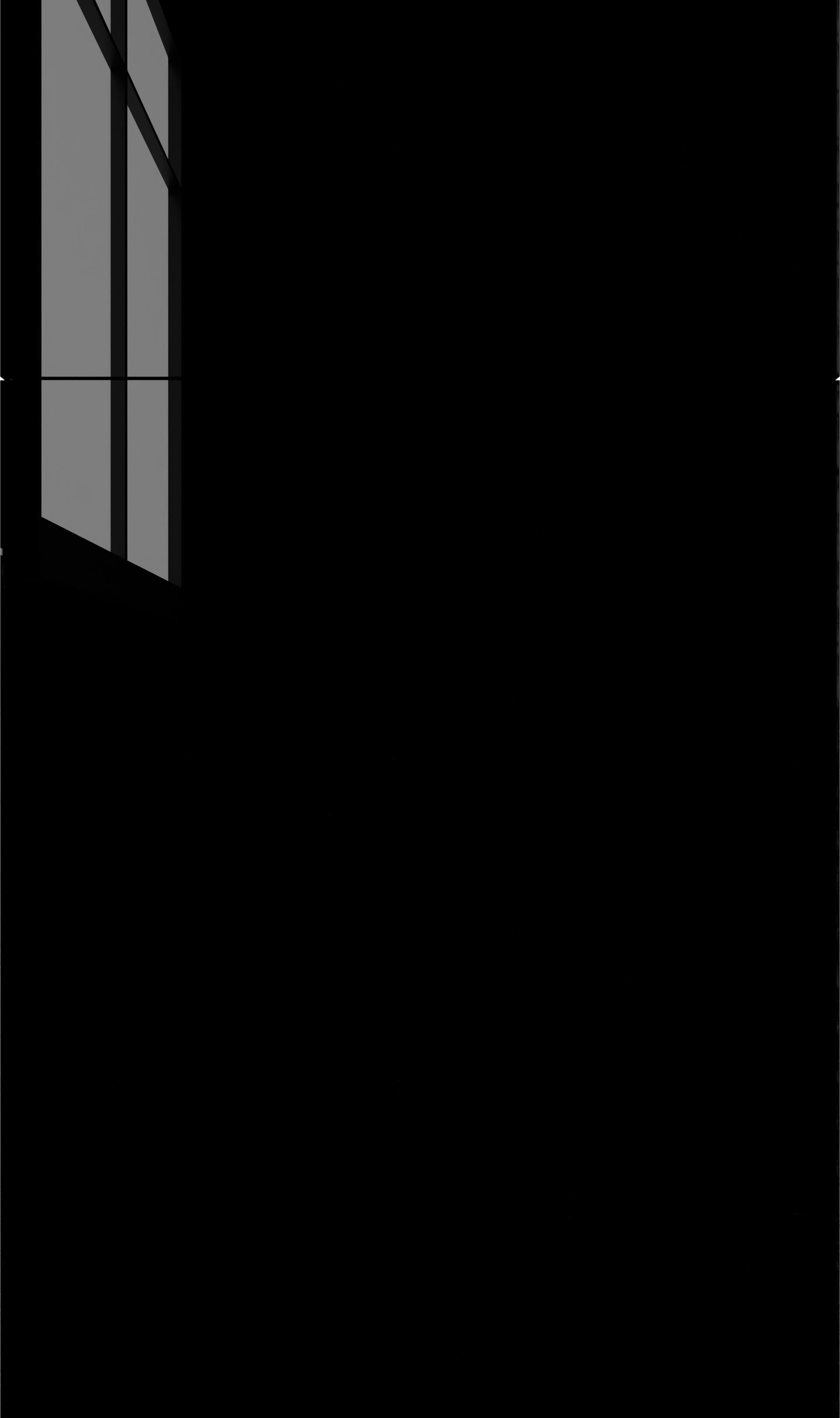 Dark interior with a narrow window at upper left letting in light
