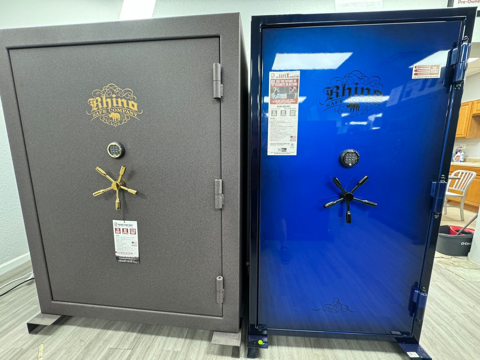 Two safes are sitting next to each other in a room.