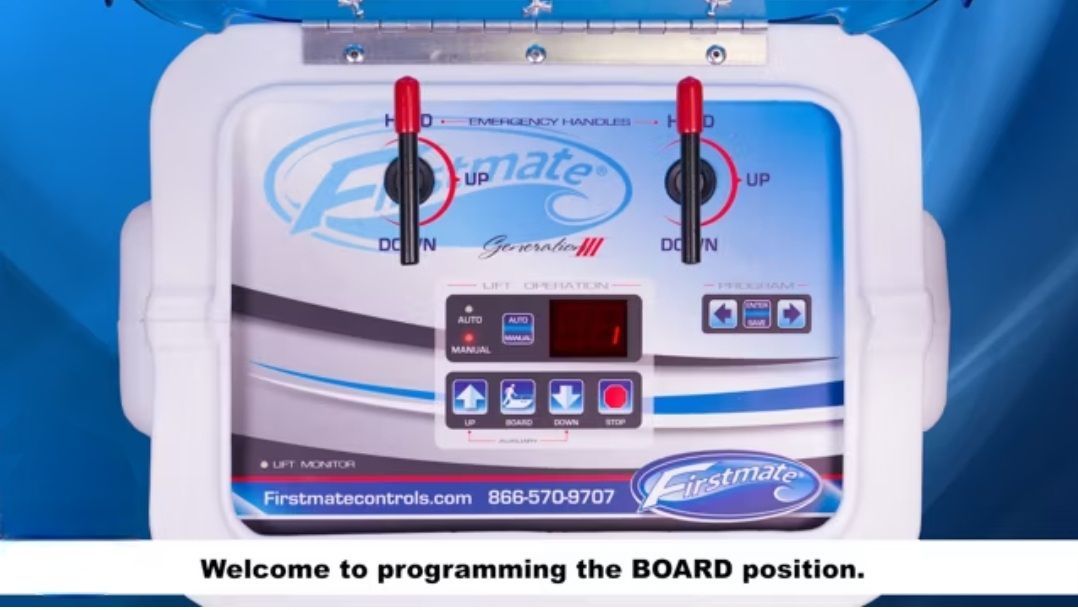 A blue and white device that says welcome to programming the board position