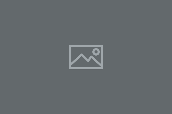 A picture of a mountain in a square on a gray background.