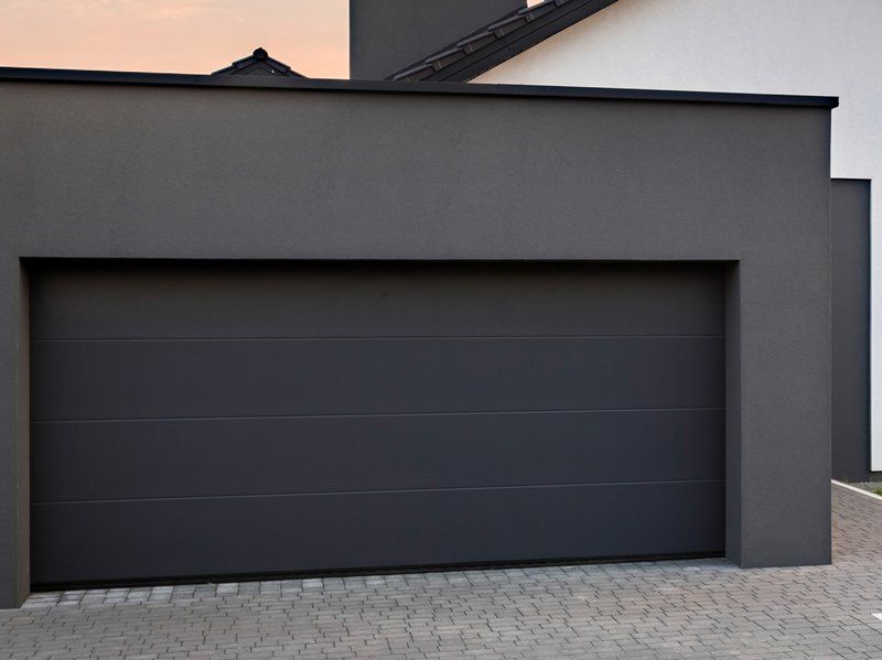 A modern smooth panel garage door