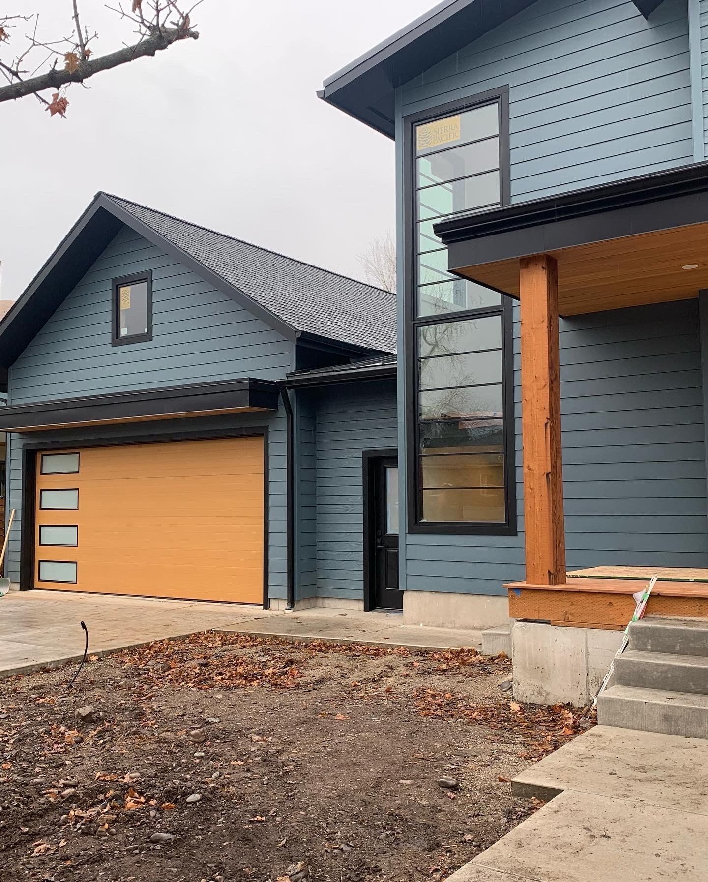 A view of house with garage door