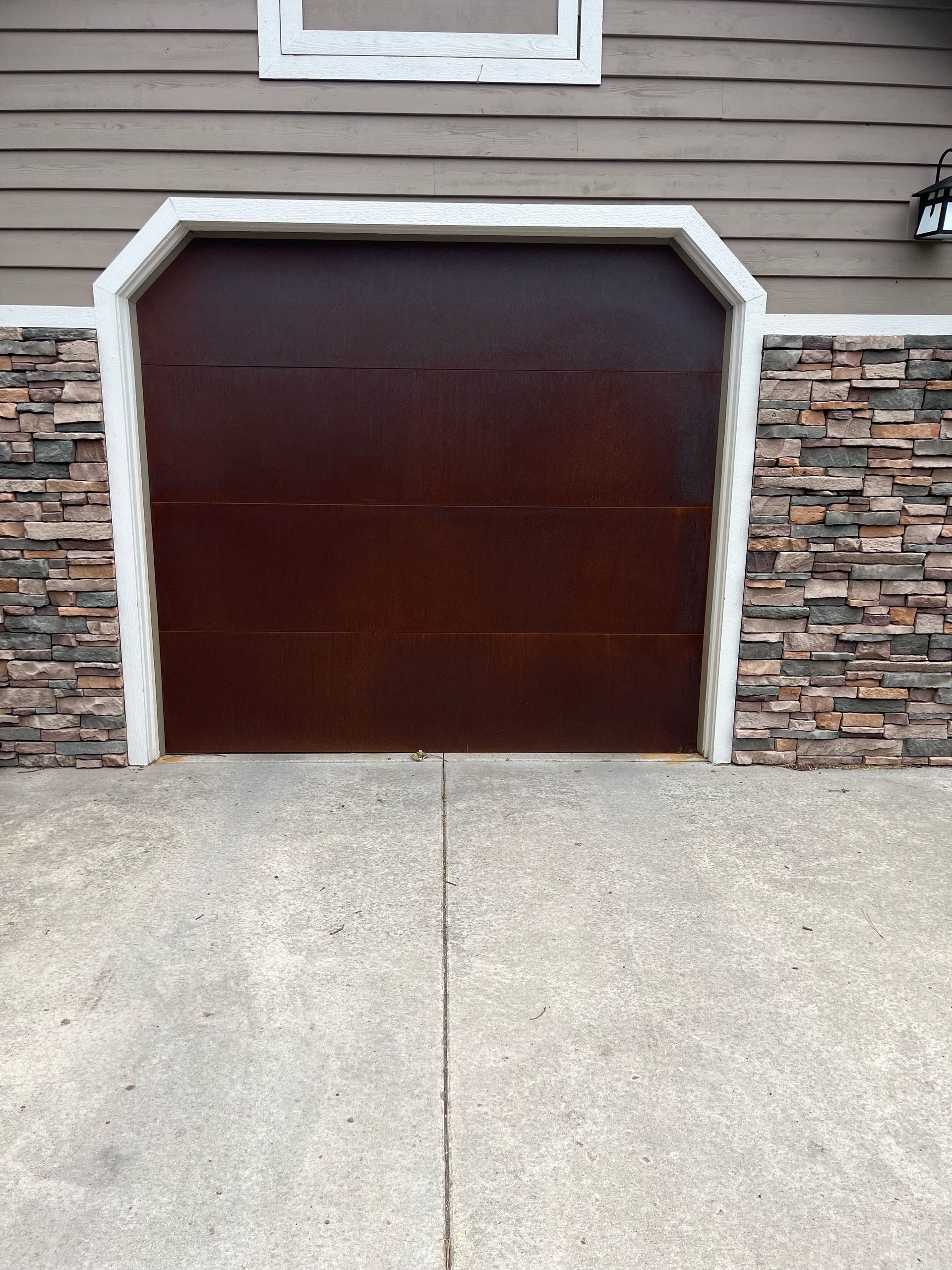 Weathered steel garage door