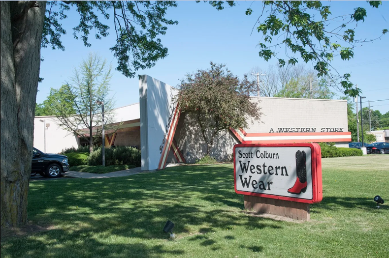 A red-bordered sign for 