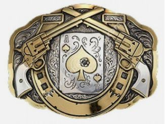 A metallic belt buckle featuring an Ace of Spades card design centered behind two crossed revolvers in gold and silver.