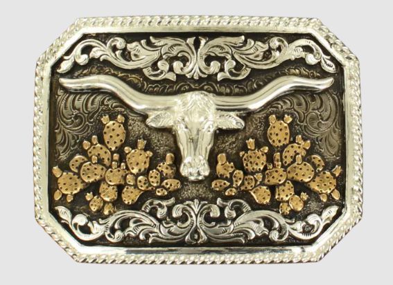 An ornate, silver-toned rectangular belt buckle featuring a central longhorn skull flanked by gold-colored prickly pears.
