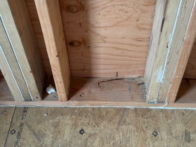 Wooden ceiling and floor framing. Construction site, natural wood tones.