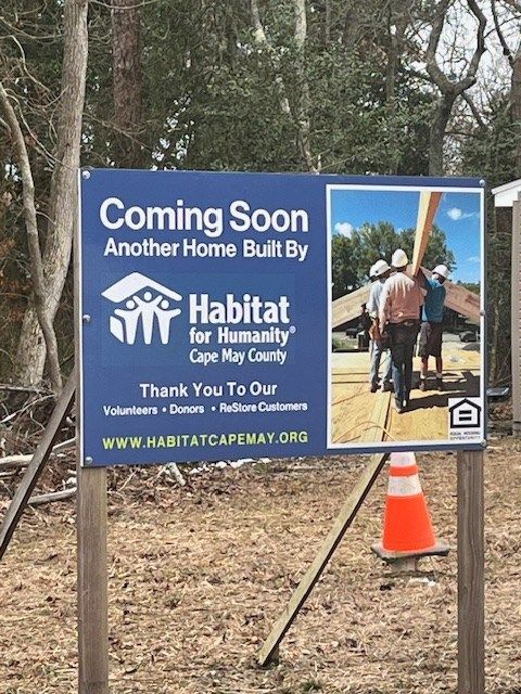 Sign for Habitat for Humanity in Cape May County, announcing a new home.