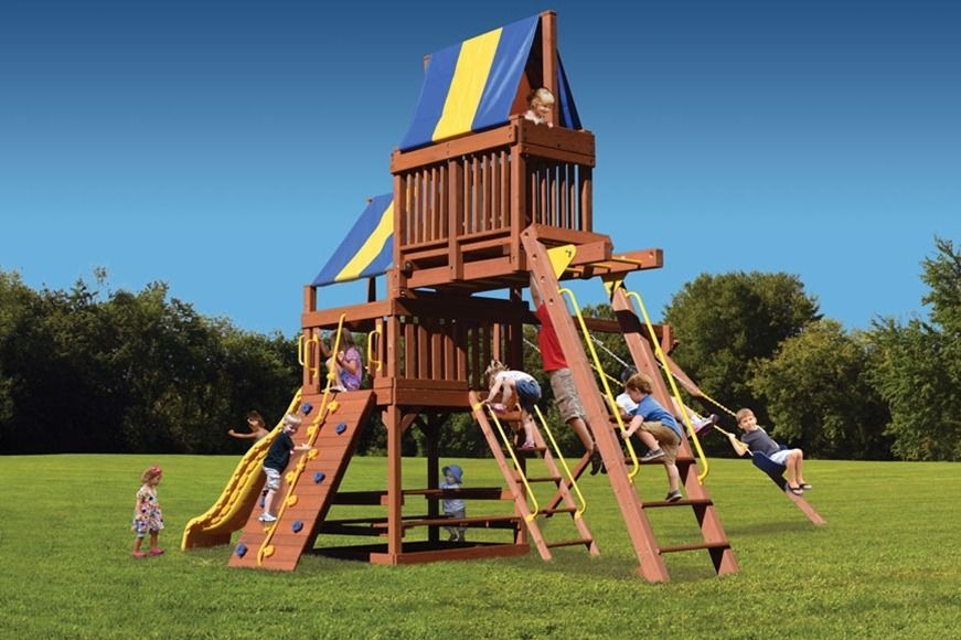 A group of children are playing on a wooden playground set