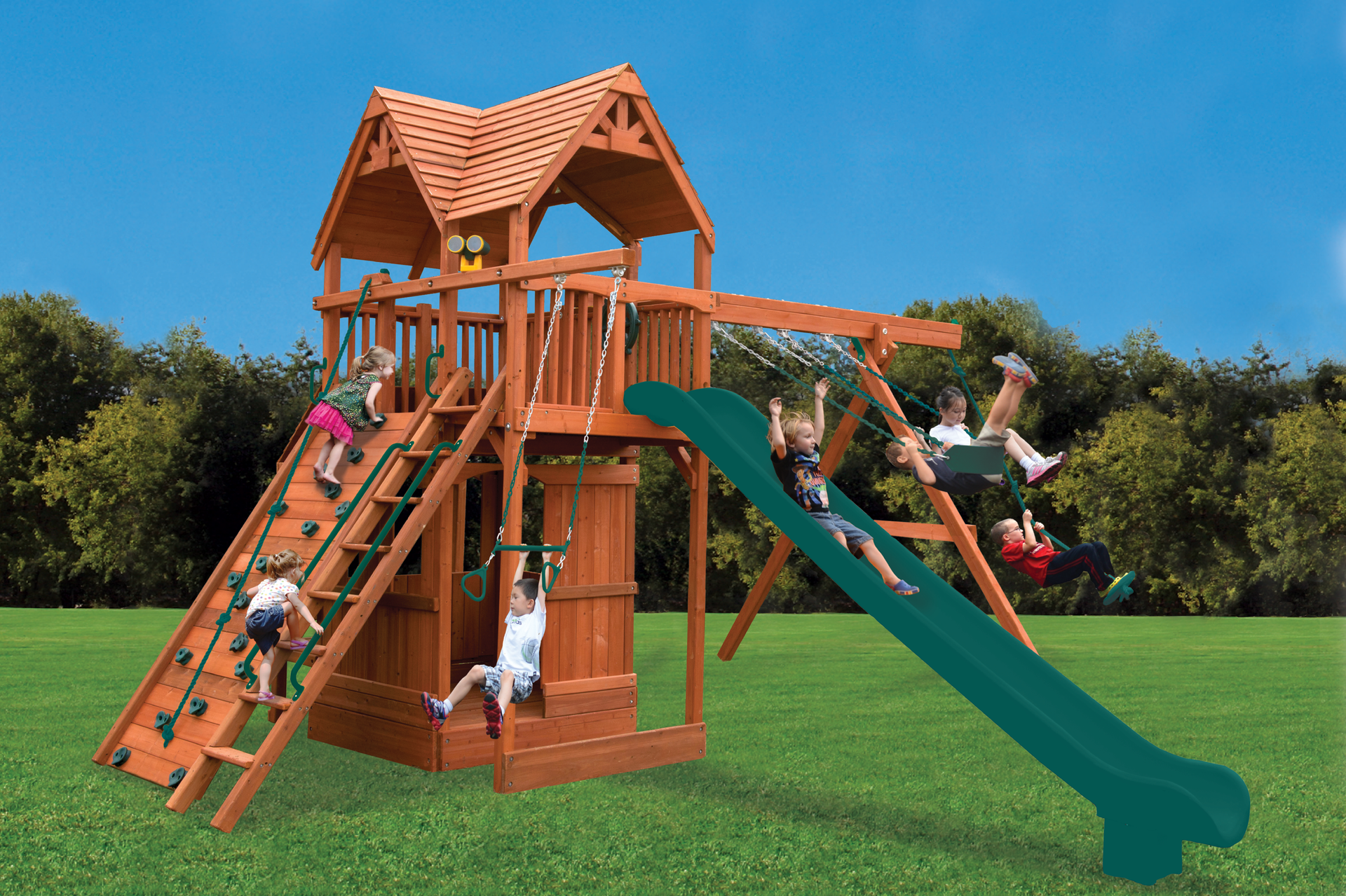 A group of children are playing on a wooden playground set with a green slide.