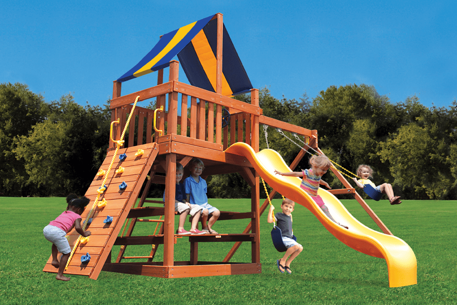 A group of children are playing on a wooden playground set