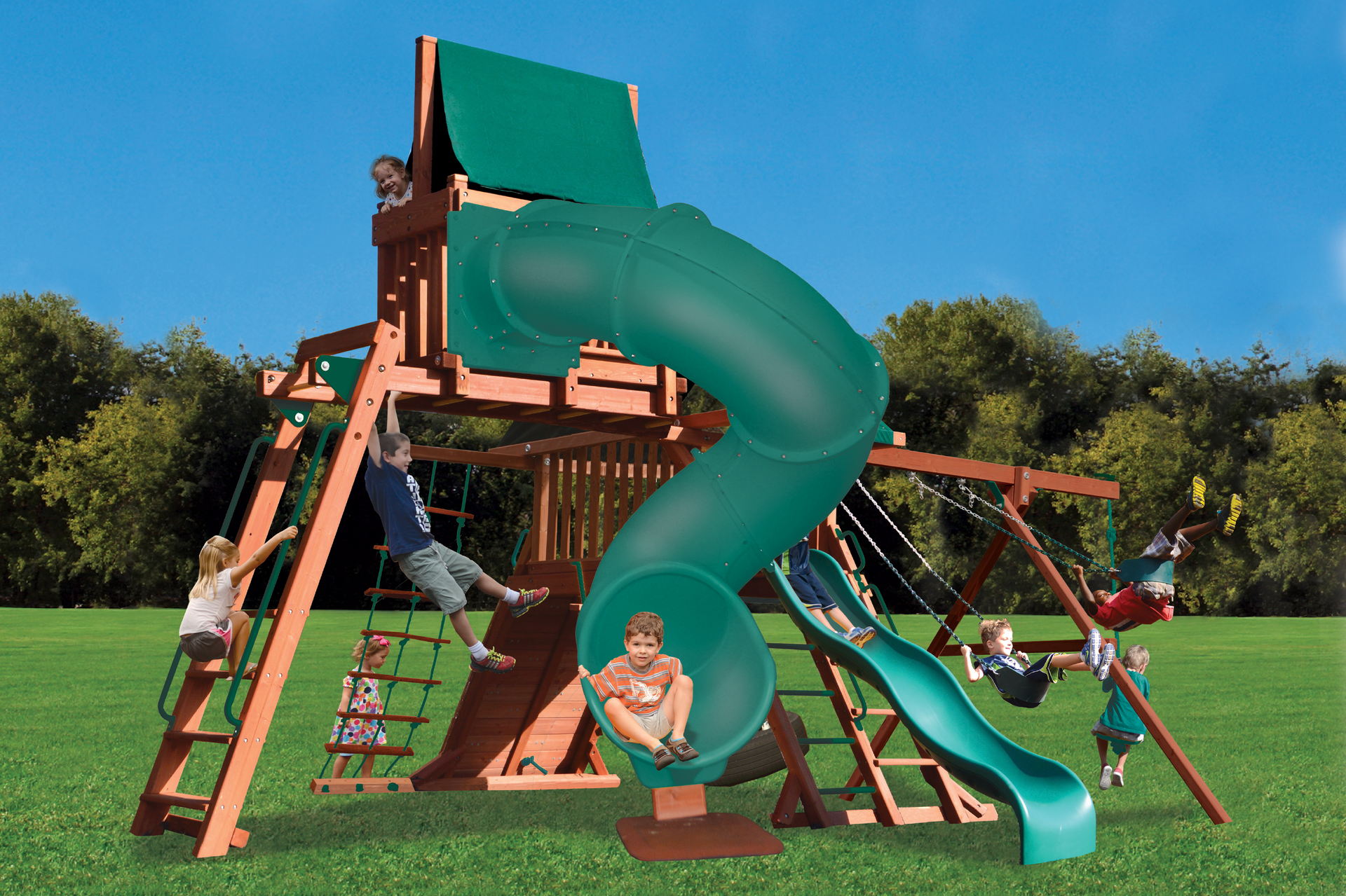 Children are playing on a playground with a green slide