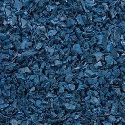 A close up of a pile of blue rubber mulch.