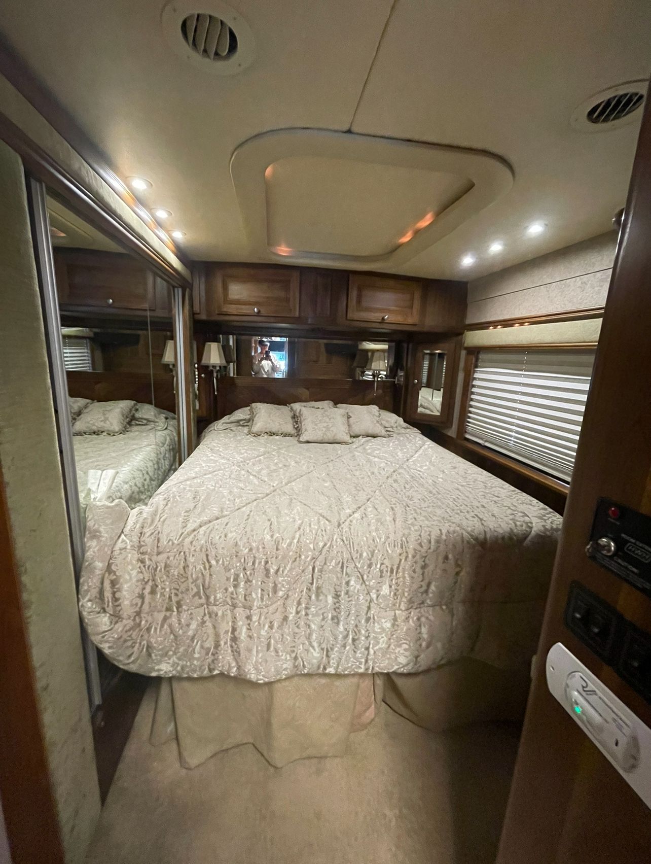 There is a large bed in the middle of the room.