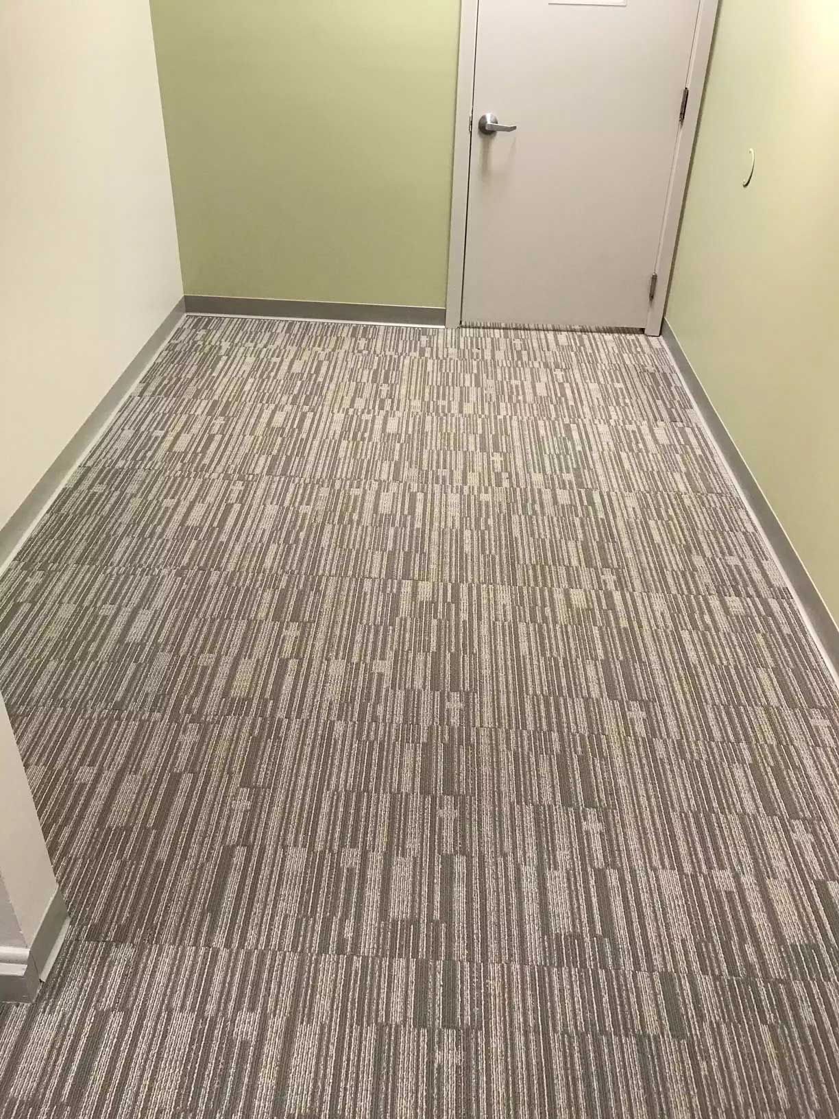 newly installed carpet in a room