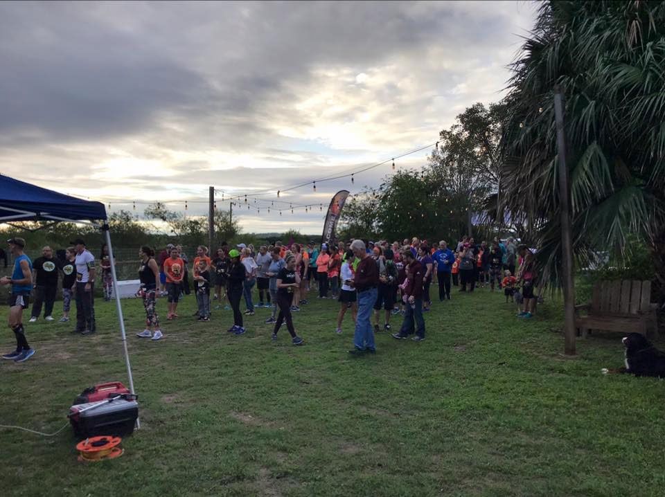 A red building with a sign that says Specht's store.