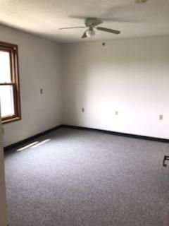 empty room with ceiling fan