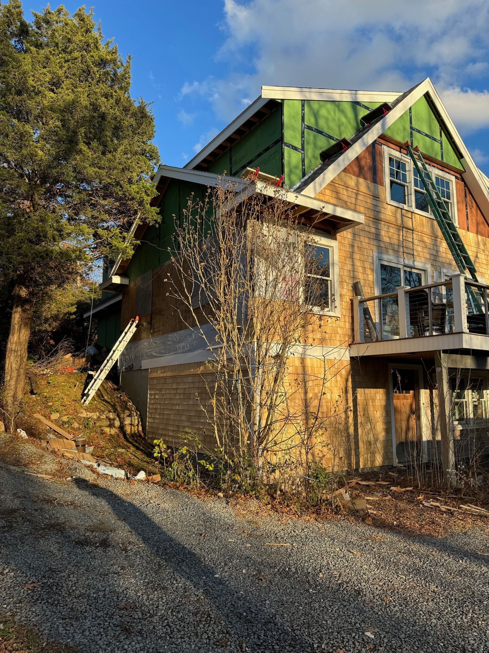 A house is being built on top of a hill.