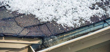 A damaged roof due to hailstorm