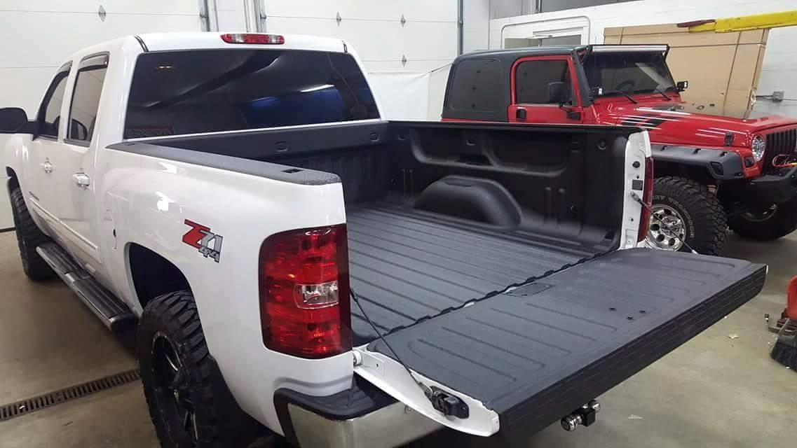 Spray-on bed liner