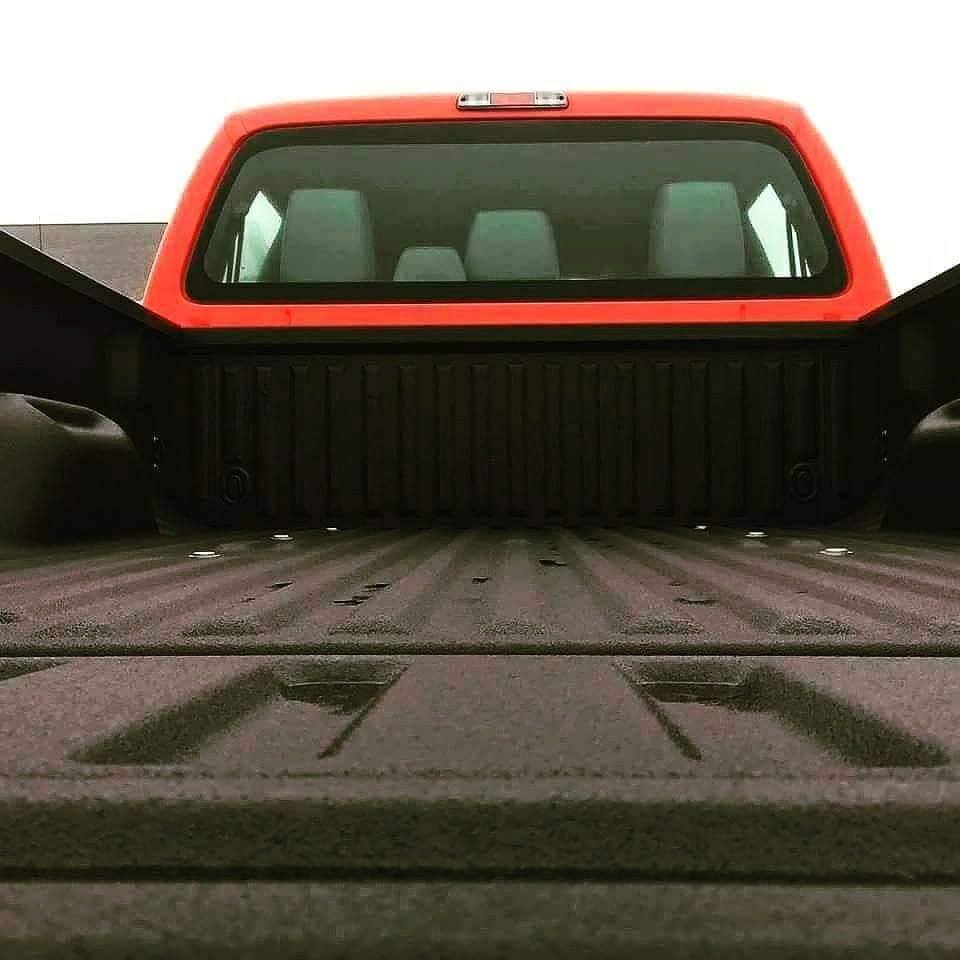 Spray-on bed liner