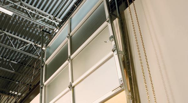 A close up of a garage door in a building.