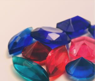 Blue, red and green gemstones
