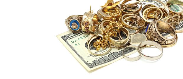 Antique jewelries on a hundred dollar bill