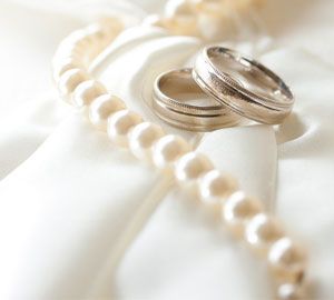 Wedding ring and pearls