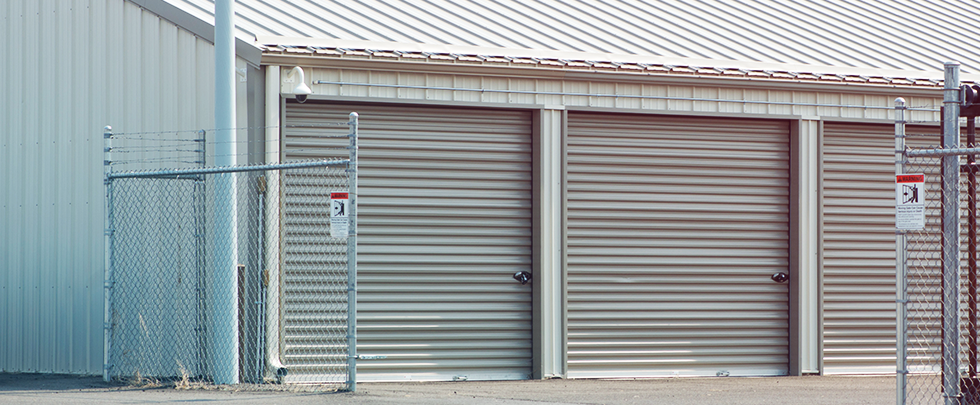 Storage units with surveillance camera and gate
