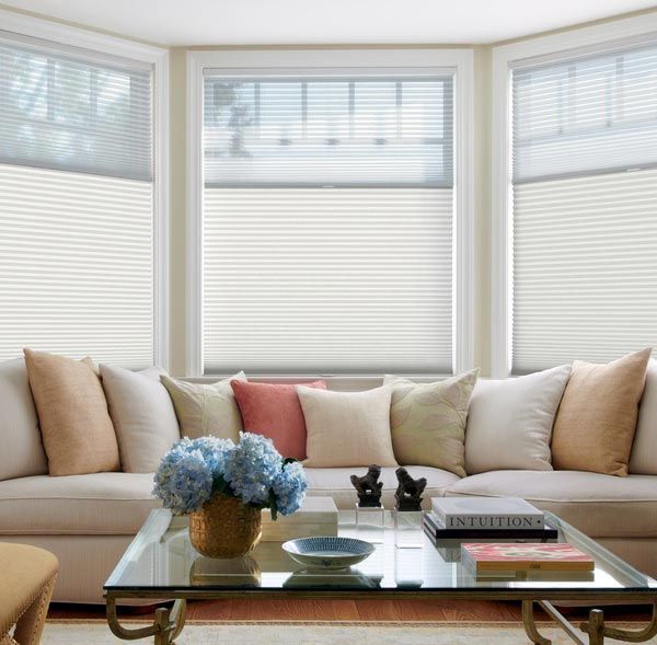 A living room with a couch and a coffee table
