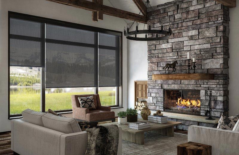 A living room with a fireplace and a couch.