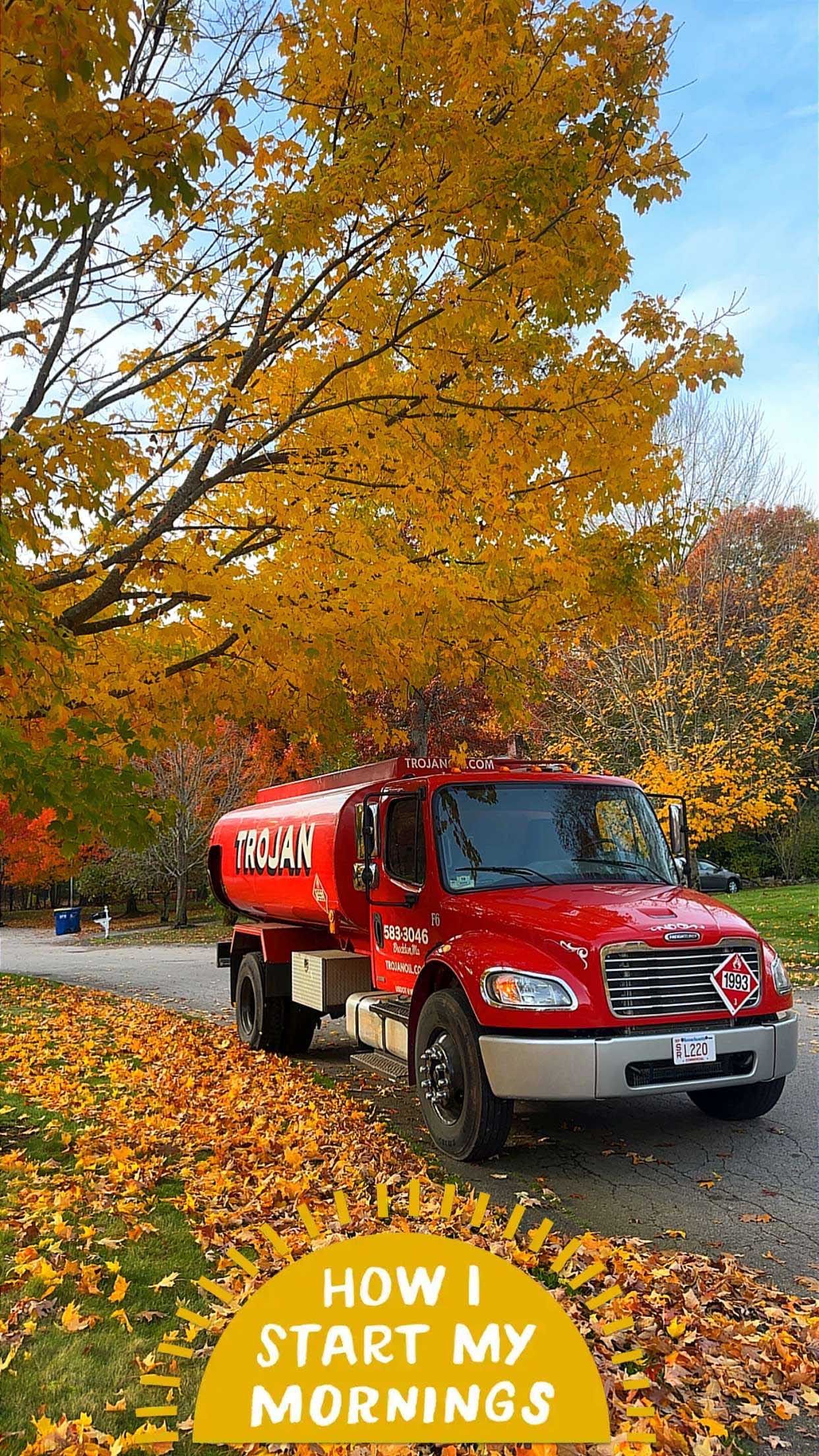Red maintenance truck on a leaf-covered road beneath orange autumn trees, with “How I Start My Mornings” text.