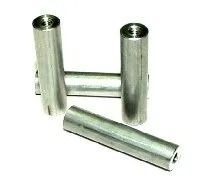 Silver metal cable ferrules with cylindrical holes, shown on a white background.