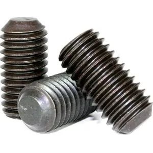 Three metal set screws on a white background, arranged upright, diagonal, and lying down.