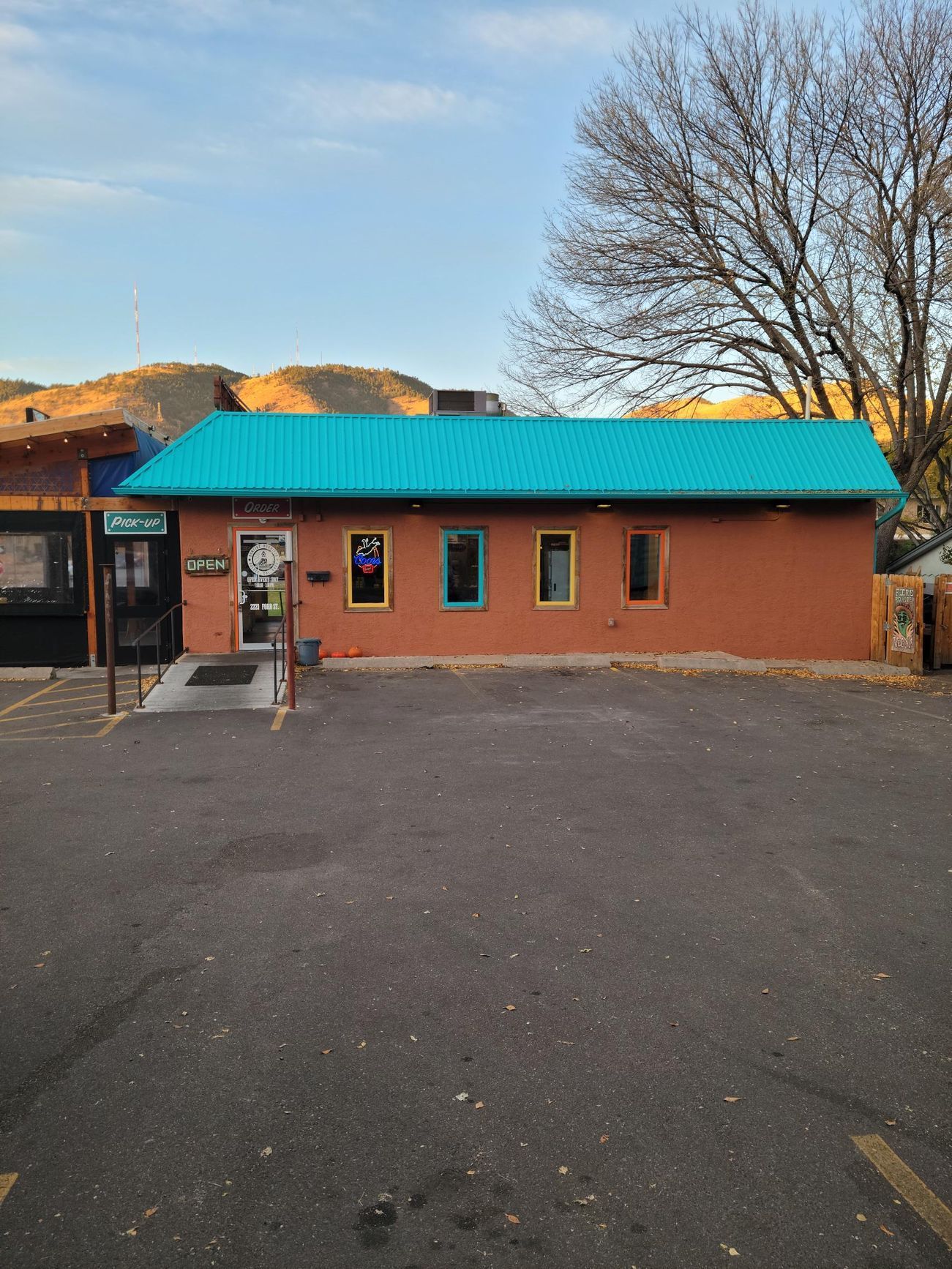 newly painted shop with colorful windows