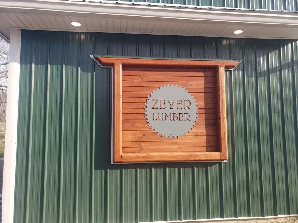 A wooden sign reading 