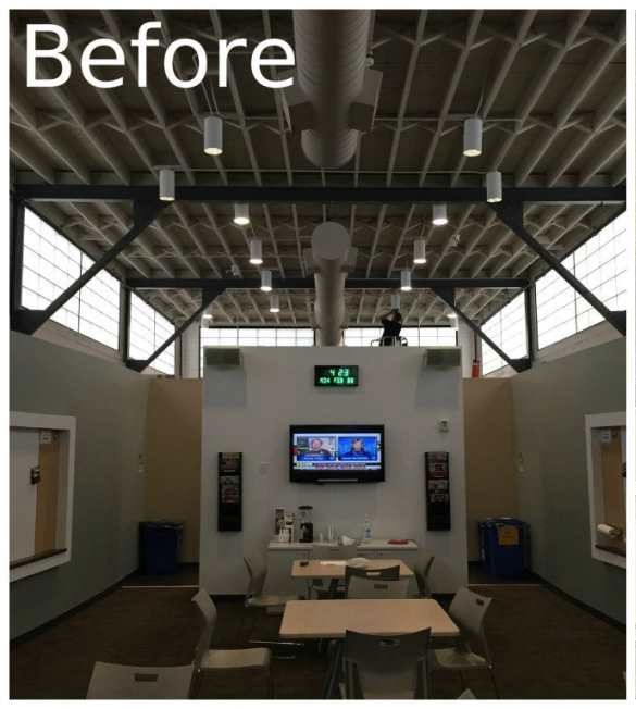 Indoor dining hall with high exposed ceiling, tables and chairs, wall TV, and green exit sign labeled “Before”